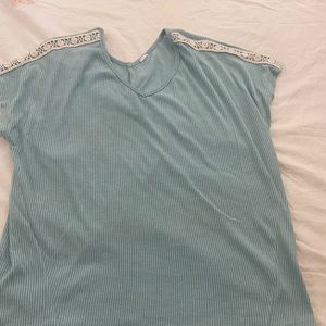 Off green colored shirt